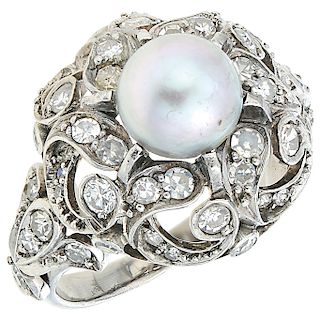A cultured pearl and diamond 18K white gold ring.