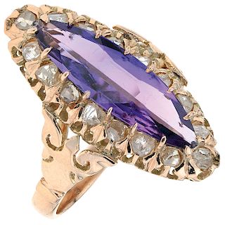 An amethyst and diamond 10K yellow gold ring.