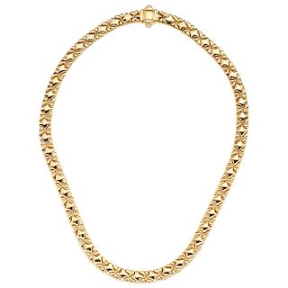 An 18K yellow and white gold necklace.
