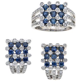 A sapphire and diamond 18K white gold ring and pair of earrings set.