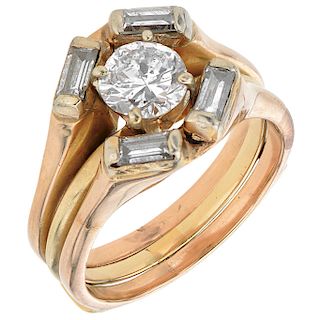 A diamond 18K yellow gold wedding ring set.