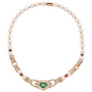 PAUL FLATO cultured pearl, emerald, ruby, diamond and 18K yellow gold choker.