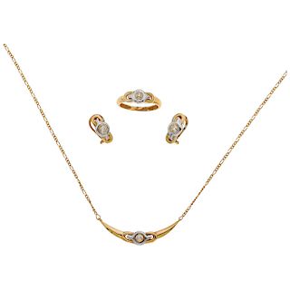 A diamond 18K yellow and white gold choker, ring and pair of earrings set.