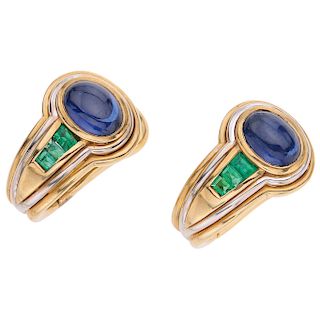 A sapphire and emerald 18K yellow gold pair of earrings.