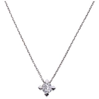 An 18K white gold necklace and diamond pendant.