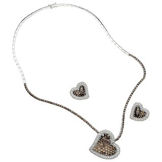 A diamond 18K white gold choker and pair of earrings set.