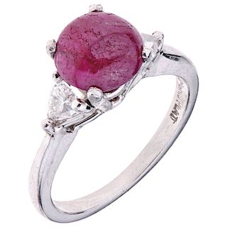 A ruby and diamond silver and iridium ring.