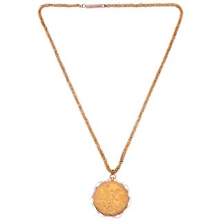 A 10K yellow gold necklace and pendant with a 21.6K yellow gold coin.