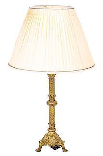 A Louis XVI Style Brass Lamp, 20th Century.