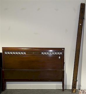 An Empire Style Gilt Metal Mounted Mahogany Bed, Northern Furniture and Company, Width of headboard 56 3/4 inches.