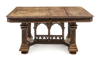 An Italian Gothic Revival Walnut Extension Table, attributed to Victor Aimone, Height 28 1/2 x width 59 1/2 x depth 47 inches (c