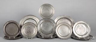 Eleven English pewter plates
