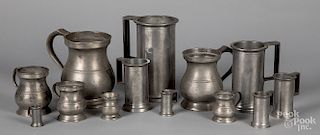 Two sets of graduated pewter measures