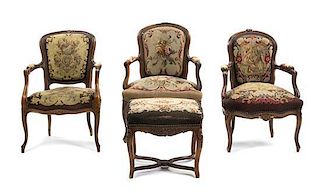 An Assembled Set of Three Louis XV Provincial Style Fauteuils, Height of tallest 35 inches.