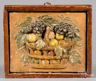 Painted plaster plaque of a basket of fruit