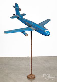 Painted airplane trade sign