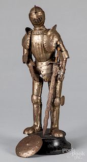 Articulated tin model of a knight