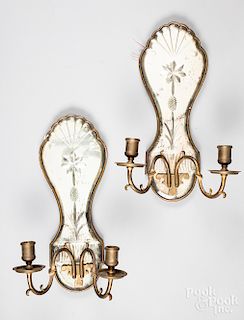 Pair of mirrored sconces with brass candlearms