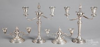 Two pairs of weighted sterling silver candelabra
