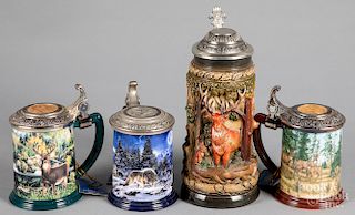 Four collectible steins
