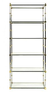 A Contemporary Chrome and Glass Etagere, Height 71 x width 31 x depth 12 3/4 inches.