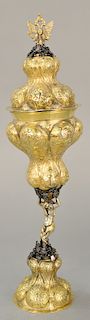Gilt silver covered chalice having Imperial style eagle finial, lobbed and chased body and stem with male figure on lobbed round ba...