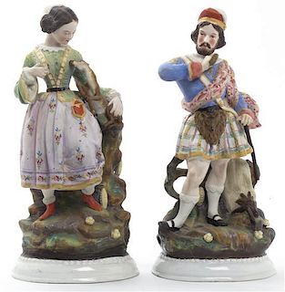 A Pair of Continental Bisque Porcelain Figures, Height 10 3/4 inches.