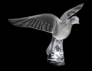A Lalique Molded and Frosted Glass Figure, Width of widest 17 inches.