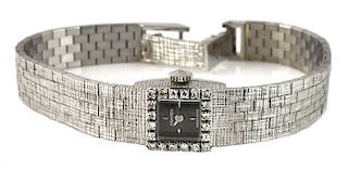 Movado Lady's Watch in 18Kt WG with Diamond Bezel