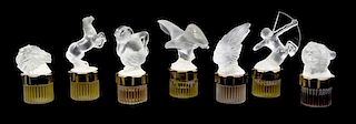 Seven Lalique Molded and Frosted Glass Perfume Bottles, Height of tallest 5 1/2 inches