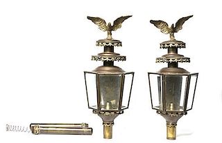 A Pair of Brass Carriage Lanterns, Height 31 inches.