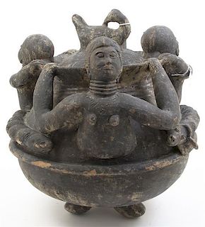 An African Pottery Vessel, Height 18 x diameter 18 inches.