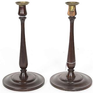 A Pair of Mahogany and Brass Candlesticks, Height 12 1/2 inches.
