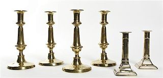 Six Brass Candlesticks, Height of first 8 3/4 inches.