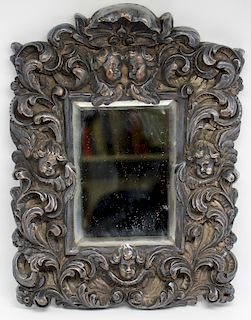 High Relief Mirror with Putti.