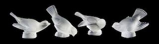 Four Lalique Molded and Frosted Glass Figures, Width of widest 5 1/4 inches.
