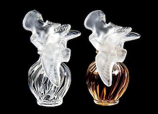 A Pair of Lalique Molded and Frosted Glass Perfume Bottles, for Nina Ricci, Height 4 1/8 inches.