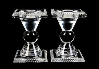 A Pair of Lalique Molded and Frosted Glass Candlesticks, Height 4 5/8 inches.
