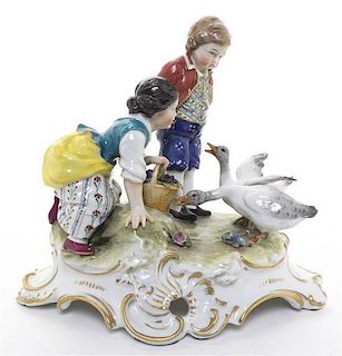 A Continental Porcelain Figural Group, Height 7 3/4 inches.