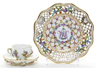 A Carl Thieme Porcelain Cup and Saucer Set, Diameter of plate 7 1/4 inches.