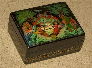A Russian Lidded Box, Height 1 3/8 x width 3 1/8 x depth 2 1/2 inches.