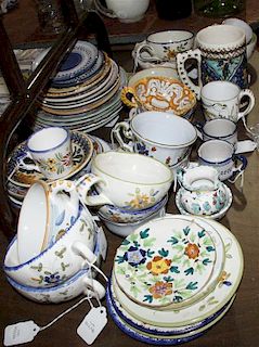 A Collection of Continental Pottery Teacups and Saucers, Height of tallest 5 1/8 inches.