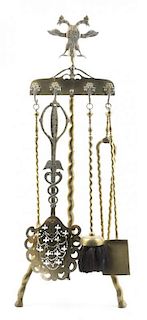 A Set of Brass Fireplace Tools, Height of stand 38 1/2 inches.