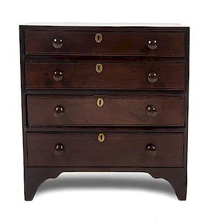 A Diminutive Mahogany Chest of Drawers, Height 18 1/4 x width 17 1/2 x depth 9 inches.