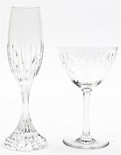 An Assembled Set of Baccarat Stems, Height of champagnes 8 3/4 inches.
