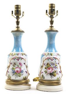 A Pair of Continental Ceramic Lamps, Height overall 24 inches.