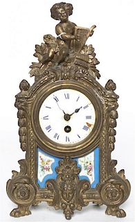 A French Gilt Metal Figural Mantle Clock, Height 12 inches.