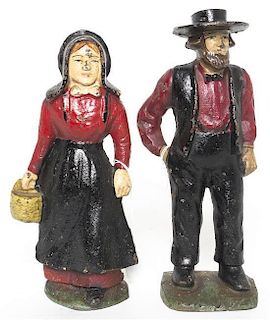 A Pair of Cast Iron Figural Door Stops, Height of tallest 9 inches.