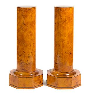 A Pair of Russian Burlwood Veneered Pedestals Height 41 1/2 inches.