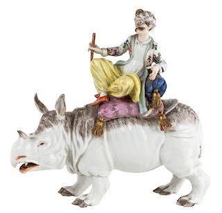 A PORCELAIN FIGURAL GROUP OF A TURK ON A RHINOCEROS AFTER A 1752 MODEL BY JOHANN JOACHIN KANDLER (1706-1775), EARLY 19TH CENTURY